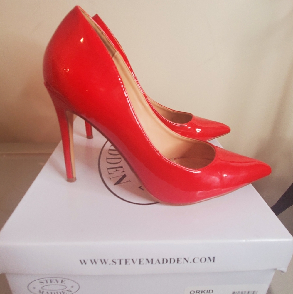 Gently used Steve Madden red high heels